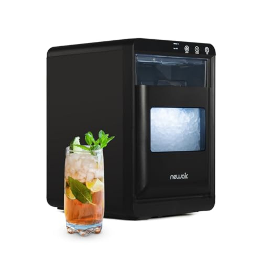 Black ice maker with a glass of iced drink on a white background