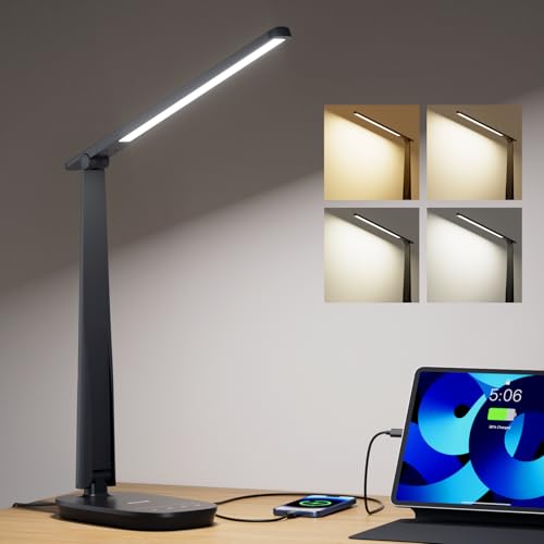 Black LED desk lamp on a wooden surface with a tablet displaying time and battery status.