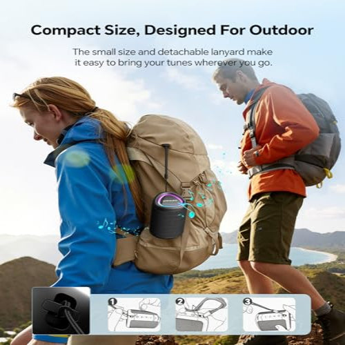 Two people with backpacks, one with a portable audio device, in an outdoor setting.