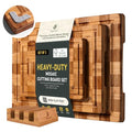 Set of three wooden cutting boards with a branded label on a white background