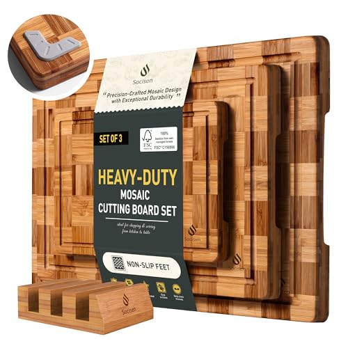 Set of three wooden cutting boards with a branded label on a white background