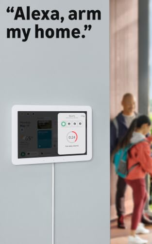 Smart home control panel with 'Alexa, arm my home' text above it, showing a child and adult in the background.