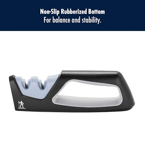 Knife sharpener with non-slip rubberized bottom on a white background