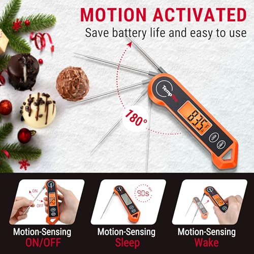 Digital thermometer with motion-activated feature on a festive background with Christmas decorations.