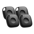 Four black wireless remote controls on a white background