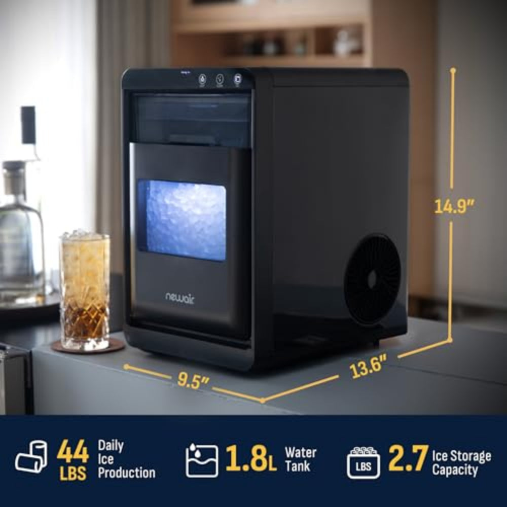 Black ice maker with measurements and specifications displayed on a kitchen counter.
