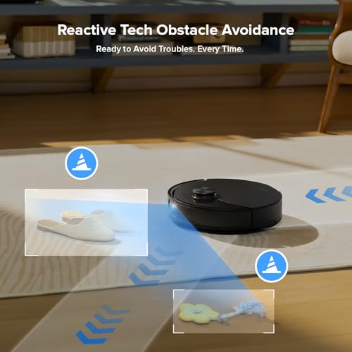 Robotic vacuum cleaner with reactive tech obstacle avoidance feature in a living room setting.