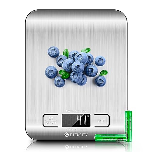 Etekcity digital kitchen scale with blueberries on a white background