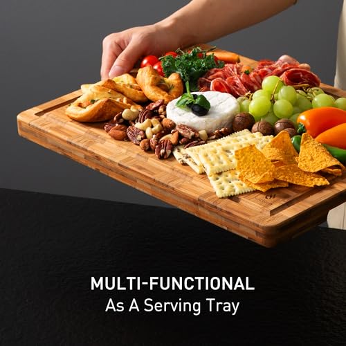 Wooden cutting board with assorted food items on a dark background