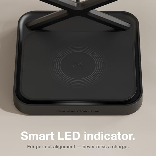 Black wireless charging pad with smart LED indicator on a beige background